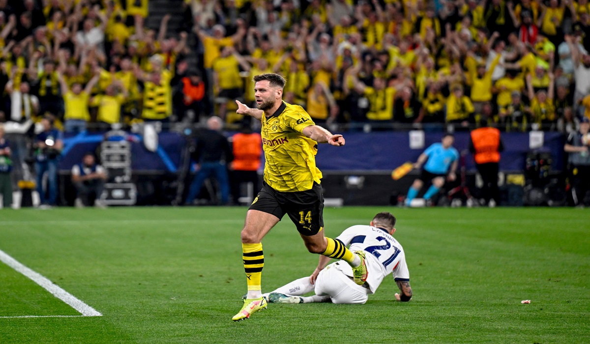 Penyerang Borussia Dortmund Niclas Fuellkrug melakukan selebrasi usai mencetak gol ke gawang PSG di laga semifinal Liga Champions.