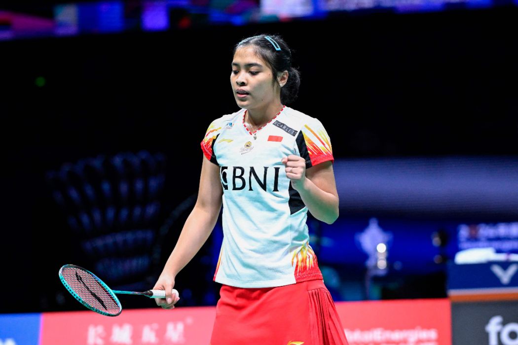 Gregoria Mariska Tunjung dari Indonesia bereaksi setelah memenangkan satu poin melawan Chen Yufei dari Tiongkok pada pertandingan final tung