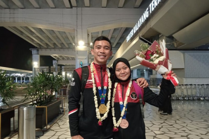 Pengorbanan Pasangan Fajar dan Aimelis Tinggalkan Buah Hati Berbuah Medali SEA Games