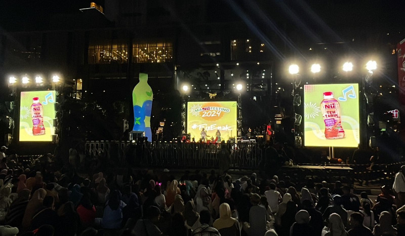 Nu Tea Tampilkan Label Desain Baru Lewat Pertunjukan Giant Bottle Video Mapping