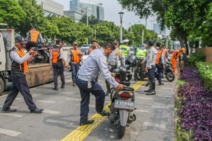 Parkir Liar di Jakarta mulai Ditertibkan, Dishub DKI: Satu Bulan ini Masih Pembinaan